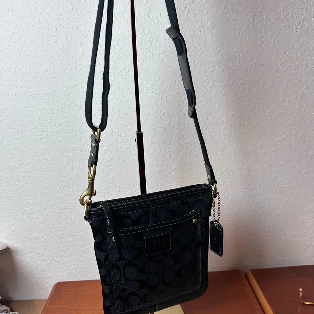 Coach Black Signature Crossbody Bag with brass hardware